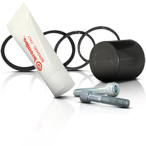 Brembo Bremssattel Reparatur-Satz mit Montagepaste, Schrauben, Dichtungen und Schutzkappe.